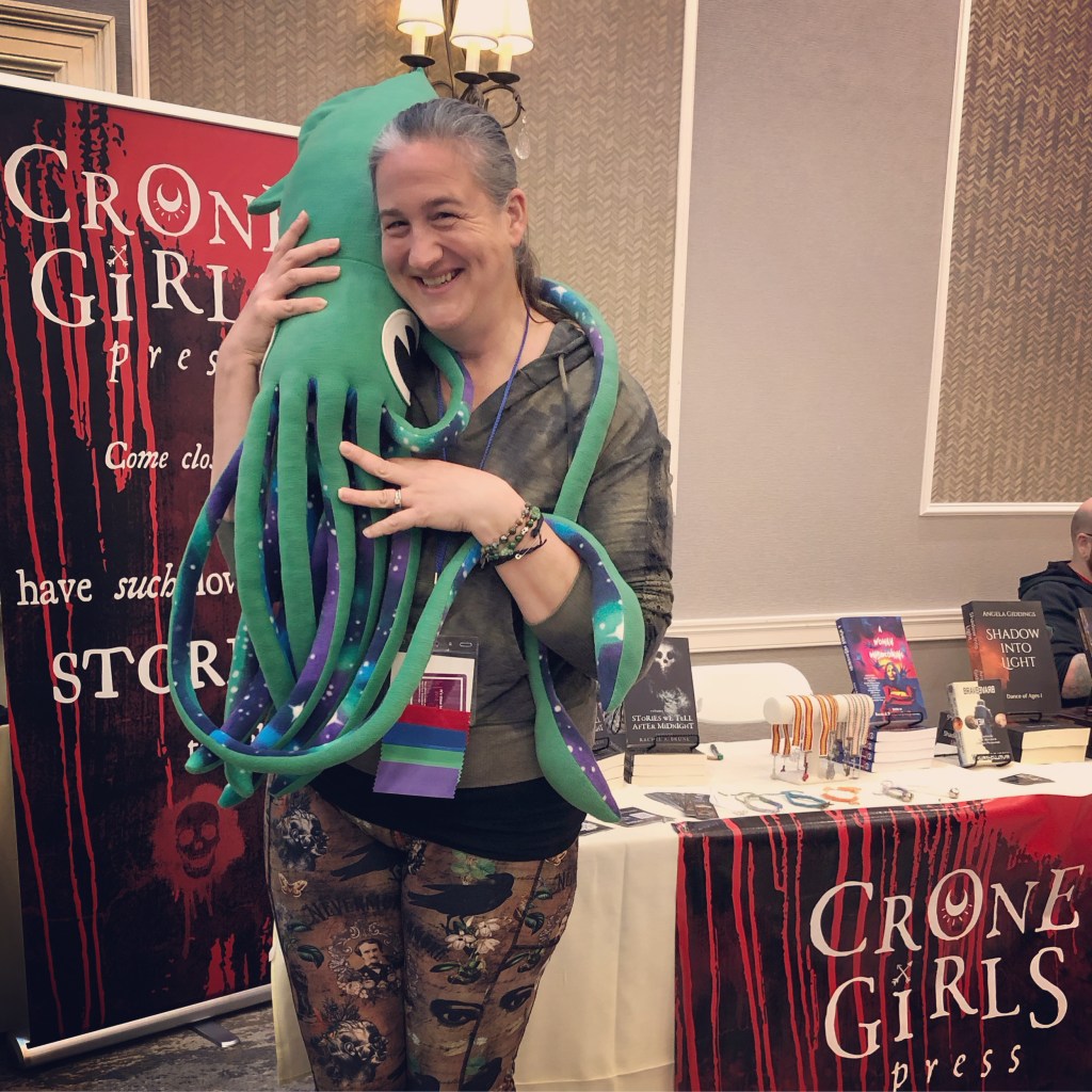 a picture of me holding a giant stuffed squid